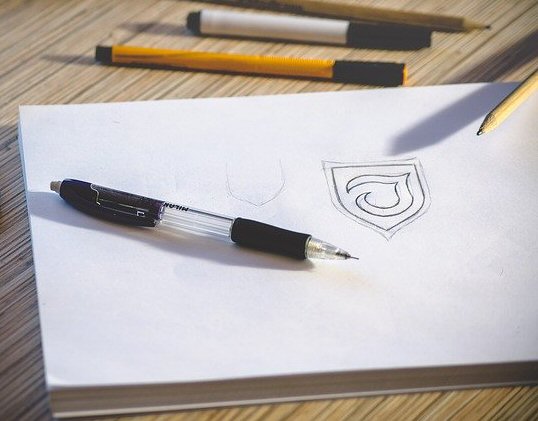embroidery logo design on paper